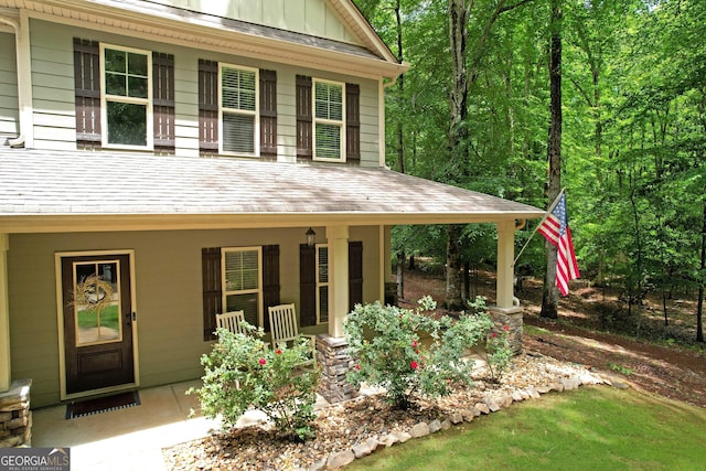 121 Hidden Springs Dr, Lagrange, GA 30240 - exterior space featuring covered porch, board and batten siding, and roof with shingles