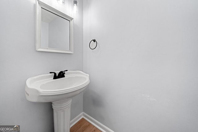 3078 Milford Chase SW, Marietta, GA 30008 - bathroom with baseboards and wood finished floors