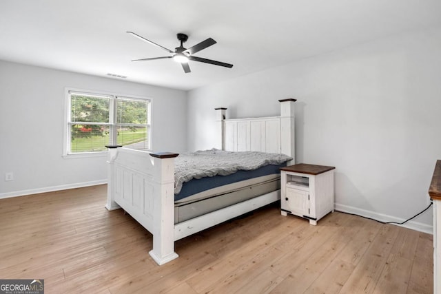 3078 Milford Chase SW, Marietta, GA 30008 - bedroom with light wood-type flooring, baseboards, and ceiling fan