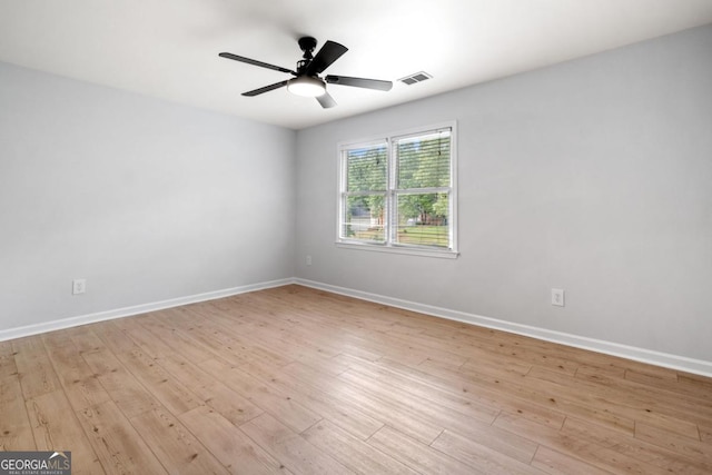 3078 Milford Chase SW, Marietta, GA 30008 - unfurnished room featuring wood finished floors, a ceiling fan, and baseboards