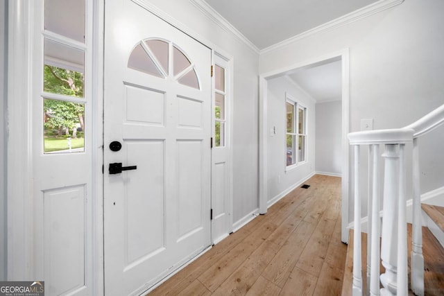 3078 Milford Chase SW, Marietta, GA 30008 - foyer with light wood-type flooring, ornamental molding, stairs, and baseboards