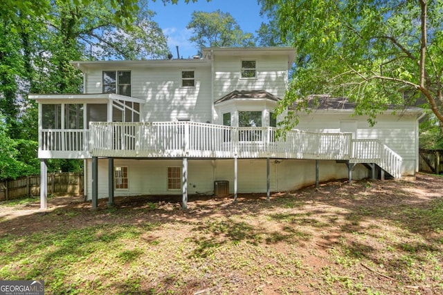 3078 Milford Chase SW, Marietta, GA 30008 - back of house with a sunroom, a deck, fence, and stairs