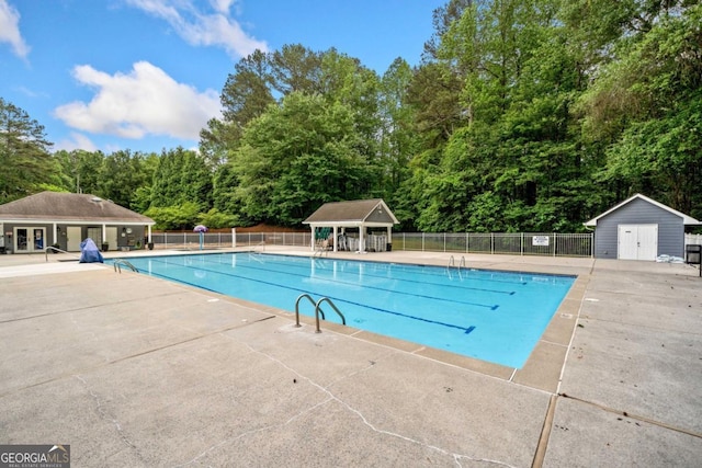3078 Milford Chase SW, Marietta, GA 30008 - community pool with fence, an outbuilding, and a patio