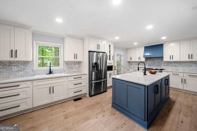 3078 Milford Chase SW, Marietta, GA 30008 - kitchen with stainless steel refrigerator with ice dispenser, crown molding, a sink, premium range hood, and tasteful backsplash