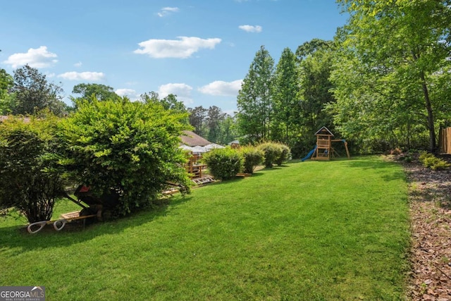 view of yard featuring a playground