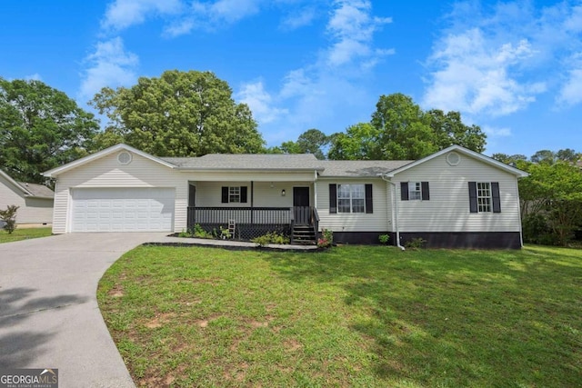view of front facade featuring a porch, concrete driveway, an attached garage, and a front yard