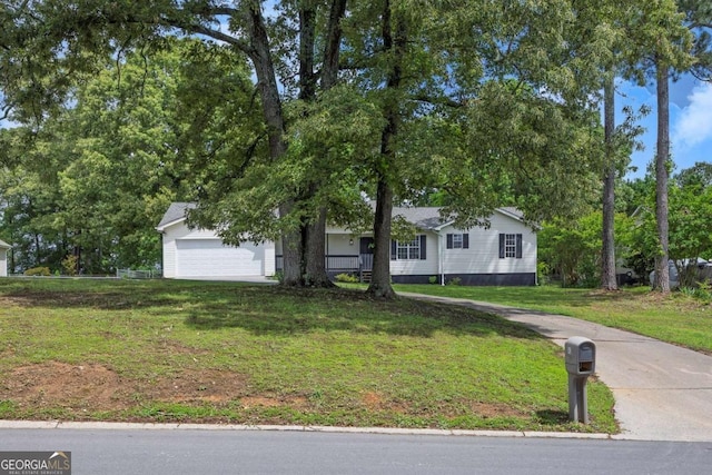 view of front facade featuring a front yard and an attached garage