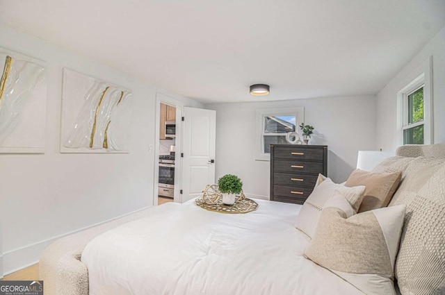 bedroom featuring baseboards
