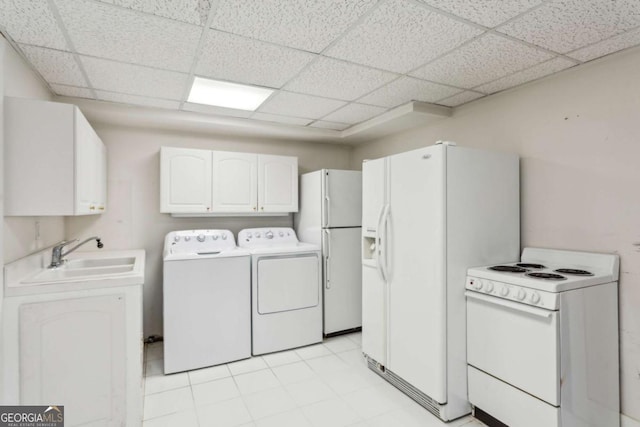 clothes washing area featuring washing machine and dryer