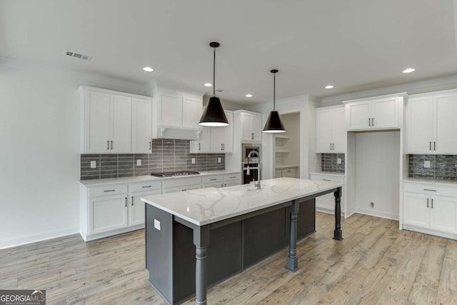 1241 Riverhill Dr, Bishop, GA 30621 - kitchen featuring stainless steel appliances, tasteful backsplash, white cabinetry, recessed lighting, and light wood finished floors