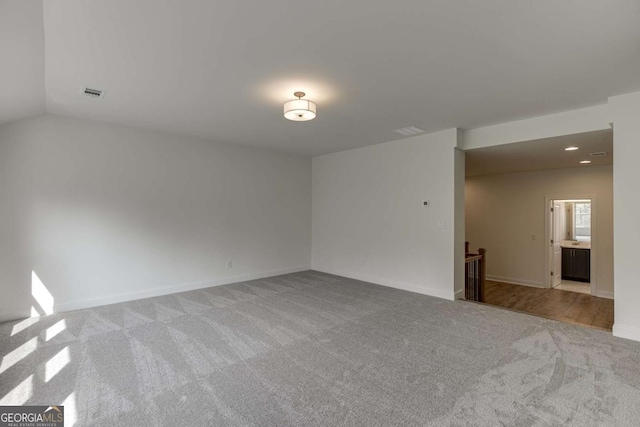 1241 Riverhill Dr, Bishop, GA 30621 - empty room featuring light carpet, baseboards, and recessed lighting