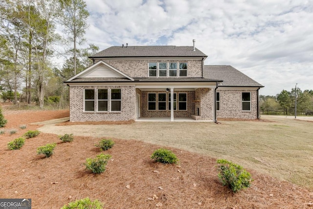 1241 Riverhill Dr, Bishop, GA 30621 - back of property with a patio area, brick siding, and a shingled roof