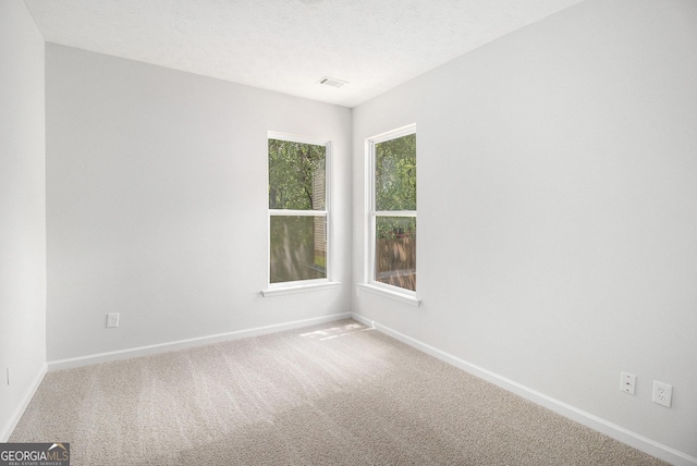 712 Brambling Way, Stockbridge, GA 30281 - carpeted empty room with baseboards