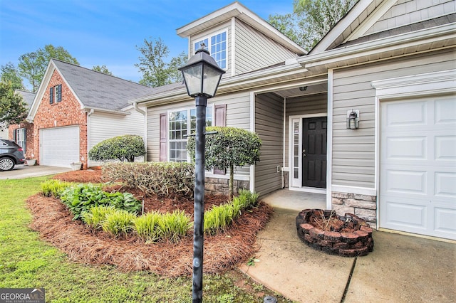712 Brambling Way, Stockbridge, GA 30281 - entrance to property featuring a garage and stone siding