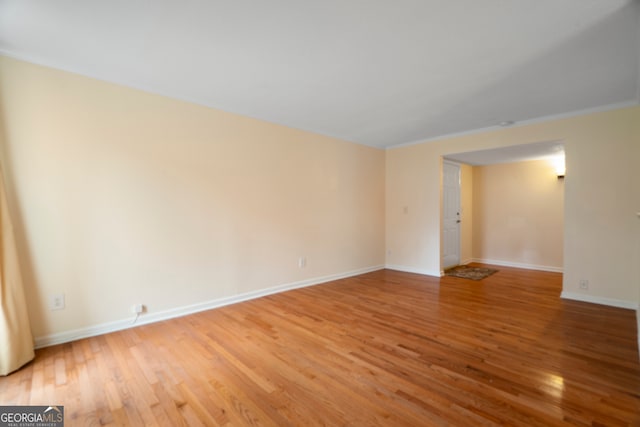 3301 Henderson Mill Rd Unit J1, Atlanta, GA 30341 - spare room with light wood-style floors and baseboards