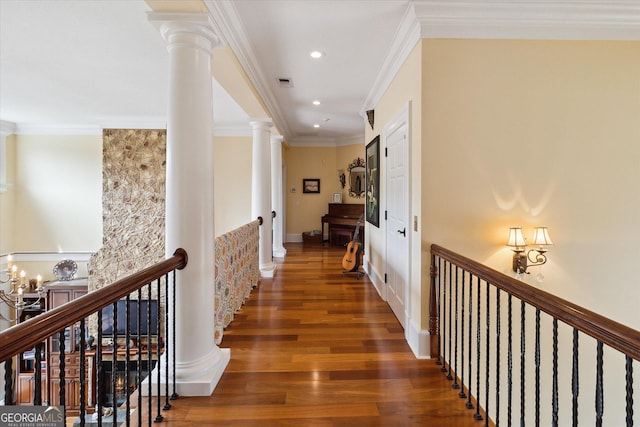 19410 Ga Highway 169, Claxton, GA 30417 - hall with ornate columns, an upstairs landing, wood finished floors, recessed lighting, and ornamental molding