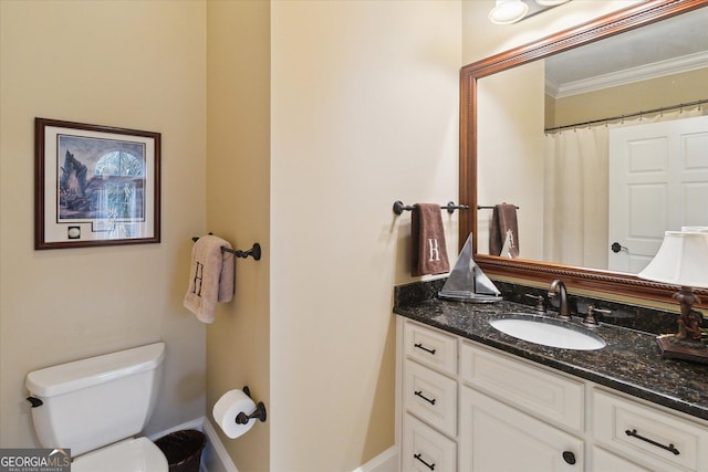 19410 Ga Highway 169, Claxton, GA 30417 - bathroom with crown molding, vanity, and toilet