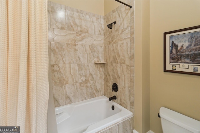 19410 Ga Highway 169, Claxton, GA 30417 - bathroom featuring tiled shower / bath and toilet