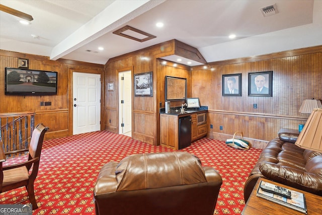 19410 Ga Highway 169, Claxton, GA 30417 - living area featuring wood walls, carpet floors, and beam ceiling