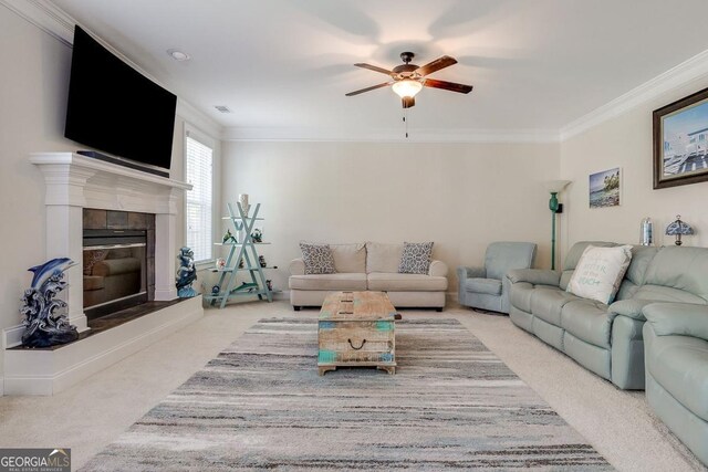 110 Bluegrass Cir, Guyton, GA 31312 - living area with ceiling fan, carpet, crown molding, and a tiled fireplace