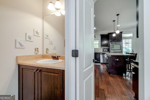 110 Bluegrass Cir, Guyton, GA 31312 - bathroom featuring wood finished floors and vanity