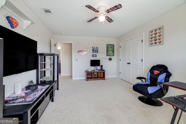 110 Bluegrass Cir, Guyton, GA 31312 - living room with light colored carpet, ceiling fan, baseboards, and an office area