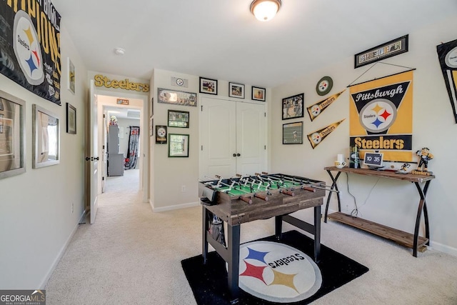 110 Bluegrass Cir, Guyton, GA 31312 - game room featuring light carpet and baseboards