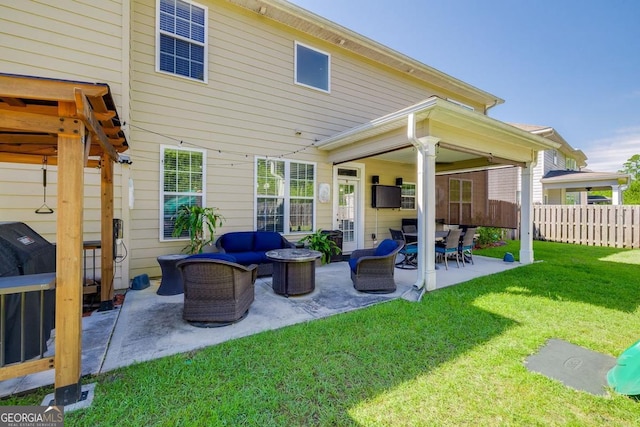 110 Bluegrass Cir, Guyton, GA 31312 - rear view of property with an outdoor hangout area and a patio area