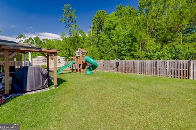 110 Bluegrass Cir, Guyton, GA 31312 - view of yard featuring a playground