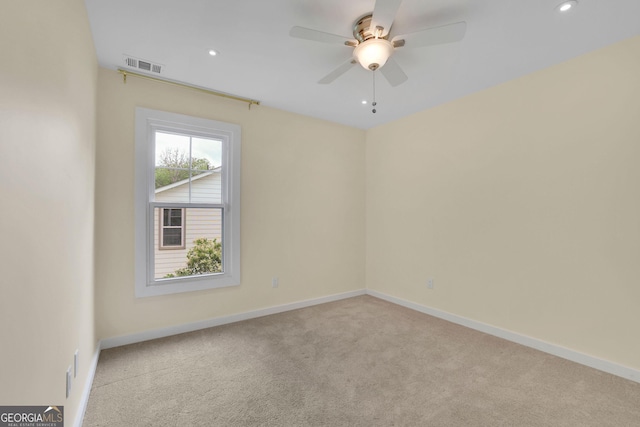 spare room with carpet flooring, a ceiling fan, baseboards, and recessed lighting