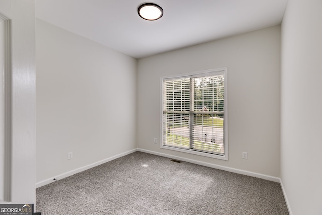 130 Opal Ln, Carrollton, GA 30116 - unfurnished room featuring carpet flooring and baseboards