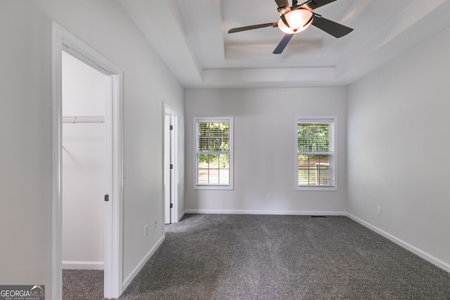 130 Opal Ln, Carrollton, GA 30116 - unfurnished room with carpet flooring, a raised ceiling, baseboards, and a ceiling fan