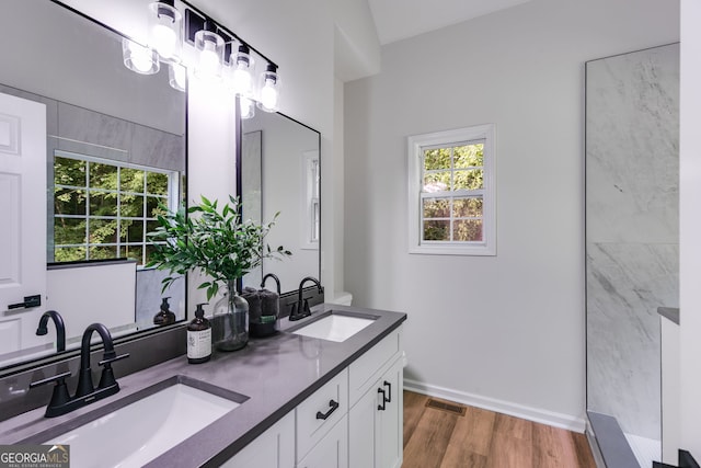 130 Opal Ln, Carrollton, GA 30116 - full bath with wood finished floors and double vanity