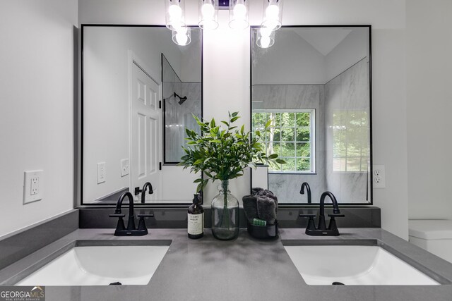130 Opal Ln, Carrollton, GA 30116 - bathroom featuring double vanity and toilet