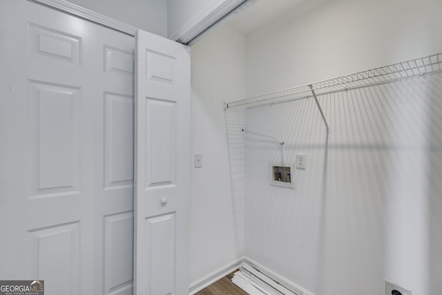130 Opal Ln, Carrollton, GA 30116 - clothes washing area featuring hookup for a washing machine, dark wood-style floors, and baseboards