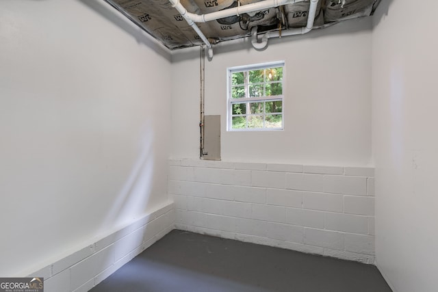 130 Opal Ln, Carrollton, GA 30116 - unfurnished room featuring concrete block wall and concrete flooring