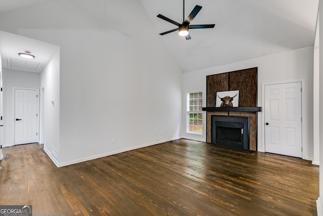 130 Opal Ln, Carrollton, GA 30116 - unfurnished living room featuring high vaulted ceiling, attic access, a ceiling fan, a fireplace, and wood finished floors