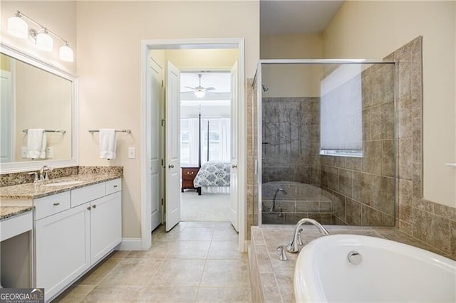 468 Scott Farm Dr, Powder Springs, GA 30127 - full bath with vanity, a bath, ceiling fan, connected bathroom, and tiled shower