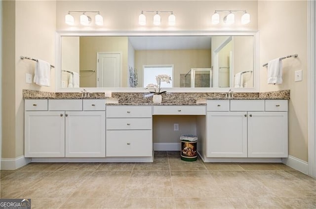468 Scott Farm Dr, Powder Springs, GA 30127 - bathroom with a stall shower, baseboards, vanity, and tile patterned floors