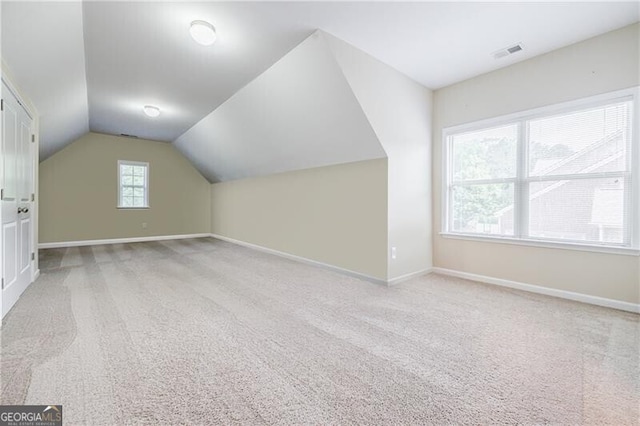 468 Scott Farm Dr, Powder Springs, GA 30127 - additional living space featuring carpet flooring, baseboards, and vaulted ceiling