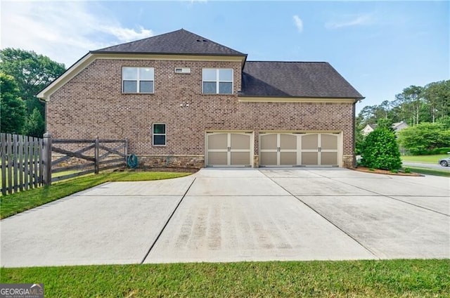 468 Scott Farm Dr, Powder Springs, GA 30127 - view of home's exterior with concrete driveway, brick siding, and an attached garage
