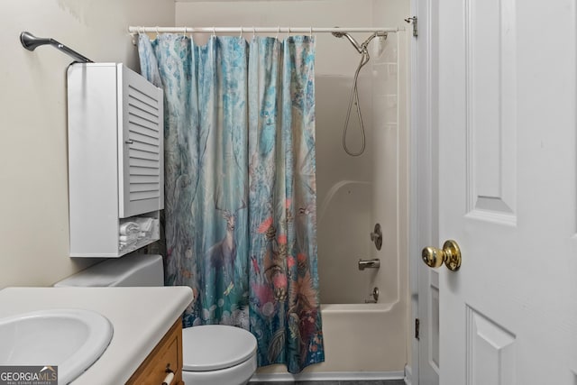 bathroom featuring shower / bath combo, toilet, and vanity