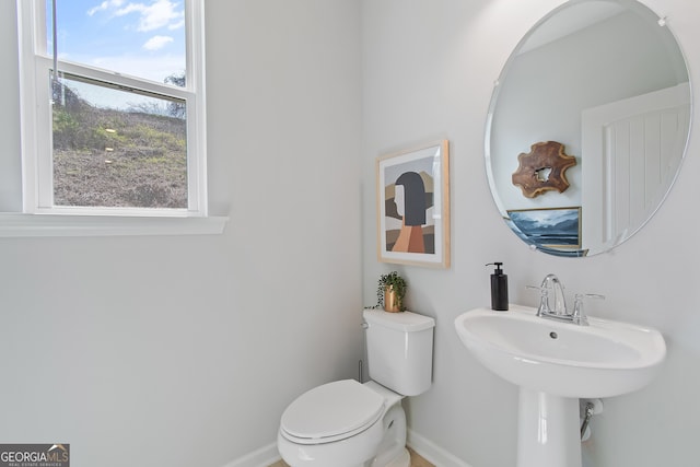3142 Washburn St, Atlanta, GA 30354 - half bathroom featuring baseboards and toilet