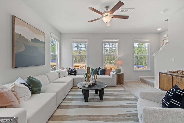 3142 Washburn St, Atlanta, GA 30354 - living area featuring light wood finished floors, ceiling fan, baseboards, and recessed lighting