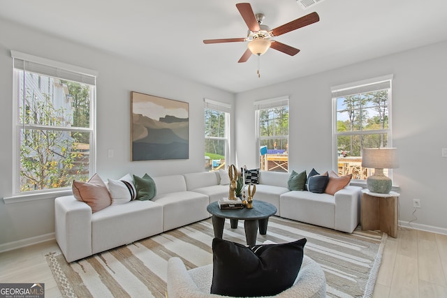3142 Washburn St, Atlanta, GA 30354 - living area featuring wood finished floors, a ceiling fan, and baseboards