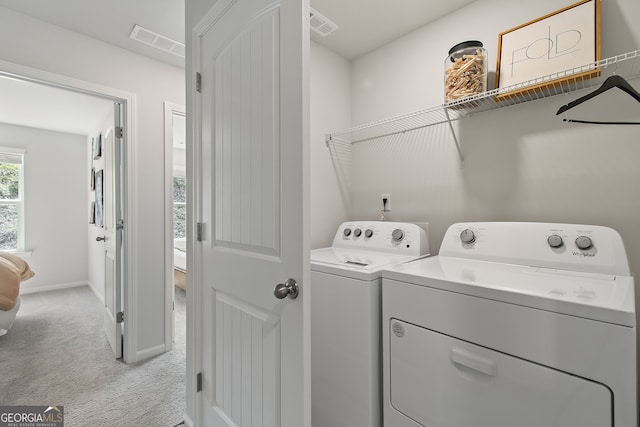 3142 Washburn St, Atlanta, GA 30354 - washroom featuring light colored carpet, washing machine and clothes dryer, and baseboards