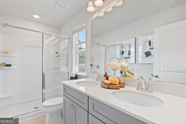 3142 Washburn St, Atlanta, GA 30354 - full bath featuring a shower stall, double vanity, toilet, and recessed lighting