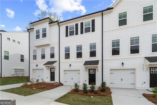 3142 Washburn St, Atlanta, GA 30354 - multi unit property featuring driveway and a garage