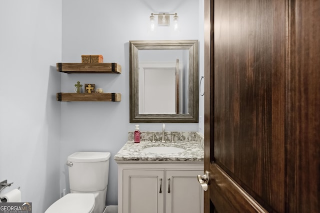 106 Chase Ln, Forsyth, GA 31029 - bathroom with toilet and vanity