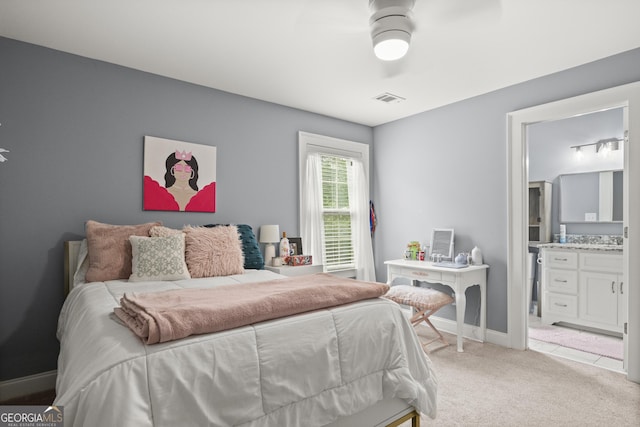 106 Chase Ln, Forsyth, GA 31029 - bedroom with light carpet and ensuite bath